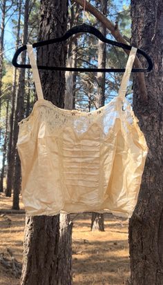 ~Victorian silk lace camisole with lace trim ~ Measurements Armpit to armpit - 19 inches  Bust - 20 inches  Waist - 19 inches  Length from top of strap to bottom - 21 inches  Some age stains but in good vintage condition  The fabric of the straps are fragile & have tears ( see last 2 photos) Victorian Lingerie, Silk Crochet, Apache Junction, Victorian Lace, Silk Lace, Lace Camisole, Lace Cami, 2 Photos, Ivory Lace