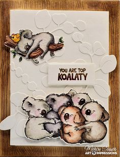 a card with koalas on it and the words you are top in white