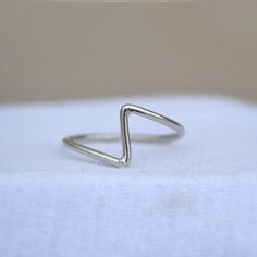 Minimalist dainty zig zag rings / Stacking sterling silver rings / Women simple rings / promise gift for her / gift for mother / Twist rings / Handmade rings / Gift for her / Sterling Silver rings / simple rings / everyday rings / daily wear rings / Delicate Ring Size 5 6 7 8 9 10 " A "zig zag ring" typically refers to a ring that features a zigzag pattern in its design. This pattern can vary in style, ranging from subtle, wavy lines to more pronounced, angular zigzags. The zigzag design might b Minimalist Silver Initial Ring, Silver Minimalist Initial Ring For Everyday, Minimalist Silver Initial Ring For Everyday, Minimalist White Gold Initial Ring, Minimalist Nickel-free White Gold Stackable Rings, Minimalist White Gold Midi Rings Nickel Free, Minimalist White Gold Nickel-free Midi Rings, Minimalist Nickel-free White Gold Midi Rings, Minimalist Hypoallergenic Silver Initial Ring