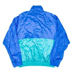 Item is in good used condition. >Size: XL >Armpit To Armpit: 28" >Armpit To Cuff: 19" >Collar To Hem: 27" Vintage Blue Windbreaker For Outdoor Activities, Blue Retro Windbreaker For Outdoor Activities, Blue Color Block Windbreaker For Outdoor, 90s Style Blue Track Jacket For Streetwear, 90s Style Blue Track Jacket For Outdoor, Blue Color Block Track Jacket For Streetwear, Blue Hooded Windbreaker With Color Block, Retro Blue Track Jacket For Streetwear, Blue Hooded Color Block Windbreaker