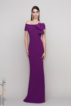 Looking for a show-stopping gown for your next big event? Look no further than the Frascara 4121. This gorgeous off-the-shoulder dress features a bow detail at the bodice and a fit and flare silhouette that is sure to turn heads. The hidden back zipper and satin lining make it both comfortable and chic. Made from 64% triacetate and 36% polyester, it's sure to be a favorite in your wardrobe. Dark Purple Gown Elegant, Boat Neck Gown, Fit And Flare Silhouette, Plain Dresses, Stunning Heels, Off Shoulder Long Dress, Green Evening Dress, Velvet Clutch, Christmas Outfits Women