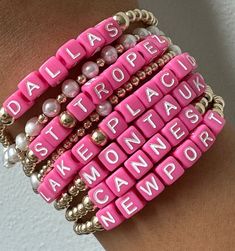 Say hello to our brand-new Destination Bracelets. These babies are all about fun and flaunting, dipped in hot pink color that's impossible to miss. Each bracelet rocks the names of our top-pick city spots and resort destinations.
This bracelets will not tarnish and you can wear this in the pool or sea.
3mm beads | Available in 6.5" or 9.5" (stretchy)
Please note that each piece is custom made with your city names and final sale. Cheap Pink Statement Name Bracelet, Cheap Playful Pink Name Bracelet, Adjustable Pink Bracelets With Letter Beads, Pink Letter Beads Name Bracelet, Custom Name Pink Jewelry For Friendship, Custom Name Pink Jewelry For Everyday, Pink Stackable Beaded Bracelets For Summer, Stackable Pink Beaded Bracelets For Summer, Everyday Pink Custom Name Jewelry