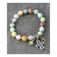 Story bracelet in beautiful detail, by Eden Merry DesignsStretch bracelet of shimmering beads and semi-precious stonesChristian charms and cross engraved FaithZinc metal with overlayRepresenting your story of faith Nickel Free Cross Bracelet With Spiritual Style, Nickel-free Cross Bracelet For Spiritual Style, Spiritual Cross Bracelets, Adjustable Cross Jewelry With Natural Stones, Adjustable Cross-shaped Jewelry With Natural Stones, Rosary Bracelet With 8mm Beads And Cross, Inspirational Multicolor Beaded Jewelry, Spiritual Beaded Cross Bracelets, Spiritual Hand-strung Cross Jewelry