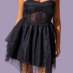 New Black Tulle Strapless Dress. Sheer Strapless Sleeveless Party Dress, Black Corset Dress For Prom Season, Black Corset Dress With Sweetheart Neckline For Party Season, Sheer Sweetheart Neckline Mini Dress For Night Out, Sheer Mini Dress With Sweetheart Neckline For Party, Sheer Strapless Dress For Party, Black Strapless Corset Dress For Summer, Black Flirty Corset Dress For Summer, Black Strapless Dress With Sweetheart Neckline For Party