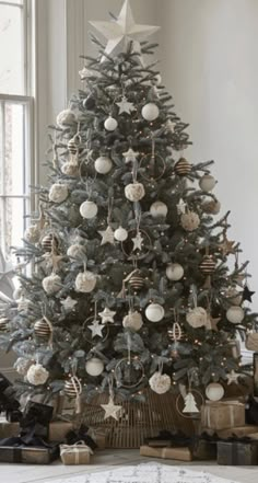 a decorated christmas tree in a living room