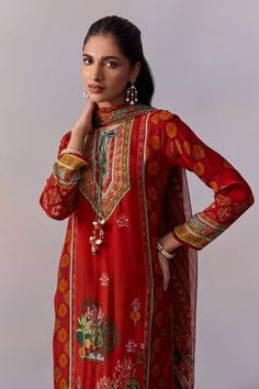 Red panelled kurta with printed scenic mughal motifs, embellished by beads and front tie. Comes with pant and dupatta. - Aza Fashions Transitional Red Sharara With Dabka Details, Designer Red Dabka Palazzo Set, Red Traditional Wear With Printed Motifs For Transitional Season, Red Kurta With Printed Motifs In Traditional Drape, Red Chanderi Palazzo Set With Dabka Detail, Red Sets With Printed Motifs In Traditional Drape, Red Traditional Drape Sets With Printed Motifs, Red Sets With Printed Motifs And Traditional Drape, Red Chanderi Kurta With Printed Motifs