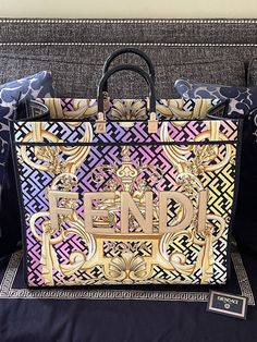 Versace X Fendi Fendace Collaboration Capsule Collection Rainbow Multicolor Gold Zucca Baroque Print Sunshine Shopper Tote Bag 19” x 16.33” x 8.5” 100% Authentic with Certilogo Includes dustbag SOLD OUT Purchased personally from Versace This bag is definitely a statement piece. It is a very massive sized tote. Perfect for carrying everything! Versace X Fendi, Purse Fendi, Shane Justin, Fendi Tote Bag, Fendi Tote, Luxury Tote Bags, Luxury Bags Collection, Bling Bags, Fendi Bag