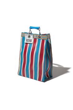 a red, white and blue striped bag with a tag on the handle is shown