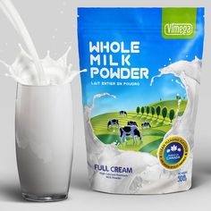 a bag of milk next to a glass with milk pouring out of it and a cow in the background