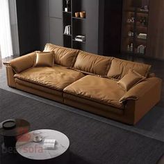 a brown leather couch sitting on top of a carpeted floor