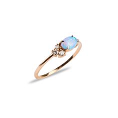 "Opal Ring, Opal Stacking Ring, Daimond Ring, Gold Opal Ring, 14k Gold Ring, Delicate Opal Ring, Bridesmaid Gift DIAMOND OPAL RING The Ring Details Rose Gold, Yellow Gold, White Gold * Solid Gold (All Gold) * Diamond : 0.12 Carat F Color SI Quality * Setting Type: Micro Pave * Number of Stones:5 * Band Width: 1.20 mm * Ready to Ship 7 Business Days Please carefully choose your ring size from the option menu during checkout. Should you have any questions, please click \"Ask a Question\" button an Opal Ring Wedding, Gold Opal Ring, Opal Stacking Ring, Opal Ring Vintage, Dainty Diamond Ring, October Birthstone Rings, White Opal Ring, Opal Wedding Rings, Baguette Diamond Rings