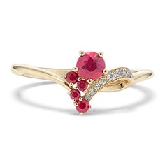 Beautiful and unique  this natural gemstone ring is crafted in warm 14-karat yellow gold. It features cascading rubies for a vibrant pop of color and sparkling diamond accents. Ruby With Diamond Ring, Yellow Gold Ruby Cluster Ring With Diamond Accents, Anniversary Yellow Gold Ruby Ring With Gemstone Accents, Yellow Gold Ruby Ring With Gemstone Accents For Promise, Diamond Cluster Ring With Gemstone Accents In Yellow Gold, Yellow Gold Diamond Cluster Ring With Gemstone Accents, Dazzling Yellow Gold Ruby Ring With Diamonds, 14k Yellow Gold Ruby Ring With Gemstone Accents, Yellow Gold Ruby Ring With Diamond Accents