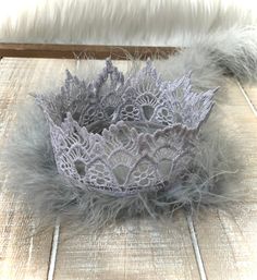 Thank you for supporting my small business! 💗  Follow me here and on Instagram.  What a great way to make a little one OR adult, feel like a princess or prince!! 👸🤴I have 6 lace crown styles.  Some are great for boys! Beautiful, hand made lace crowns.  Perfect for newborn photos, special occasions, birthdays and photo ops.  Add feathers, rhinestones, and/or a glitter birthday number! I make different crown designs and colors, giving you the option of simple to fancy. 💎  I also make 21-inch crowns for adults.  Check out my other listings in my Lace Crowns category! The venice lace is stiffened with a non-toxic fabric product. I DON'T  PAINT THE LACE. I secure a chenille stem around the crown base to help retain its shape. All crowns are 4 inches wide (12 inches diameter).  The lace size Lace Crown Tutorial, Crown Styles, Silver Crowns, Newborn Crown, First Birthday Crown, Lace Crown, Feather Crown, Lace Crowns, Mini Crown