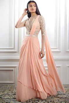 Shop for Mandira Wirk Peach Viscose Georgette Embroidered Pre-draped Saree Gown for Women Online at Aza Fashions Saree Gown Party Wear, Draped Saree Gown, Indo Western Saree, Saree Gowns, Drape Sarees, Pleated Saree, Peach Saree, Gown Party Wear, Full Sleeve Blouse