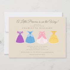 three princess dresses in different colors on a card