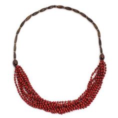 In bright red and brown this necklace is designed by Sumalee Nawakul in Thailand. She crafts the beaded necklace by hand with littleleaf boxwood beads creating a waterfall at the center. Multi-strand Red Necklace With Wooden Beads, Multi-strand Necklace With Red Wooden Beads, Red Multi-strand Necklace With Wooden Beads, Red Fair Trade Jewelry With Round Beads, Red Fair Trade Beaded Necklace As Gift, Red Fair Trade Necklace As Gift, Artisan Red Necklace With Wooden Beads, Artisan Multi-strand Red Necklaces, Artisan Multi-strand Red Necklace