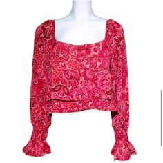 Elevate Your Wardrobe With This Stunning Red Paisley Floral Crop Ruffle Blouse. Featuring A Trendy Square Neckline And Long Sleeves, This Blouse Is Perfect For Any Occasion. The Paisley Pattern And Ruffle Accents Add A Touch Of Femininity To This Versatile Top. Pair It With Jeans For A Casual Look Or Dress It Up With A Skirt For A Night Out. The Blouse Is Brand New With Tags And Comes In A Variety Of Sizes To Fit Any Woman's Style. Add This Beautiful And Unique Blouse To Your Collection Today. Red Long Sleeve Blouse With Blouson Sleeves, Red Blouse With Blouson Long Sleeves, Spring Red Blouse With Blouson Sleeves, Red Square Neck Top For Spring, Red Paisley Print Summer Top, Summer Red Blouse With Paisley Print, Red Long Sleeve Blouse With Paisley Print, Red Bohemian Tops With Paisley Print, Red Bohemian Blouse With Paisley Print