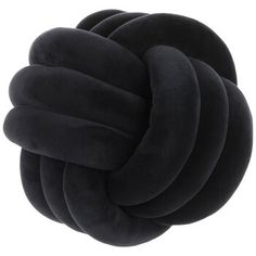 a black round pillow on top of a white background