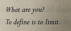 an old typewriter with the words what are you? to define is to limit