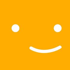 a yellow square with two white circles on it and a smiley face in the middle