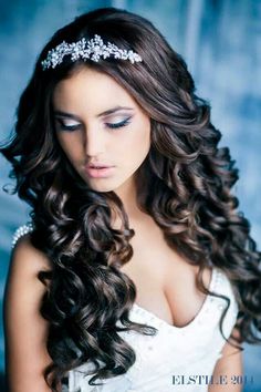 Bridal Hair Style: Long curls and a tiara. For this hair color ask your hairstylist for Aloxxi Hair Color Personality Pompeii And Circumstance® | bridal hair styles | bride hair Quince Hair, Sweet 16 Hairstyles, Glamorous Wedding Hair, Curly Wedding Hair, Quinceanera Hairstyles, Tiara Hairstyles, Quince Hairstyles