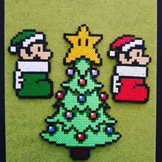 some pixelated christmas trees are sitting on the ground