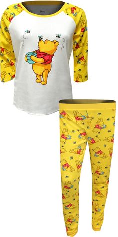 Perfect for relaxing on a lazy day. These Junior Cut pajamas for women feature the lovable Winnie the Pooh with his honey pot, being tickled by bees. The fabric is a waffle knit and the sleeves are 3/4 length. Matching bottoms in yellow are a jogger style. Junior cut, 60% Cotton, 40% Polyester. Cute Winnie The Pooh, Disney Pajamas, Pajamas For Women, Camo Dress, Stitch Clothes, Honey Pot, Lazy Day, Fashion Joggers, Disney Ladies