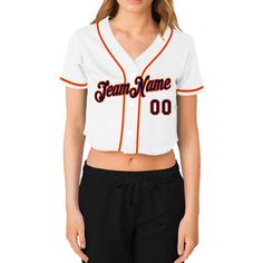 a women's crop top with the name team name 00 on it in orange and white