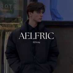 a man standing in front of a store window with his hands on his hips and the words aelfric behind him