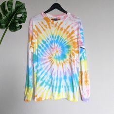 Tie Dye Long Sleeve T-Shirt Bright Pastel Rainbow Colors, Has Pink, Orange, Yellow, Lilac, Turquoise And Green Unisex Sizing Hand Dyed In Pcb, Florida Has Stretch Preshrunk 100% Cotton 21.5" Pit To Pit | 29" Long 026 Multicolor Long Sleeve T-shirt For Summer, Multicolor Rainbow Print T-shirt For Spring, Multicolor Long Sleeve Summer T-shirt, Blue Tops With Rainbow Print For Spring, Blue Top With Rainbow Print For Spring, Casual Green Tops With Rainbow Print, Rainbow Long Sleeve Cotton Top, Casual Long Sleeve Tops With Rainbow Print, Casual Long Sleeve Rainbow Print Tops