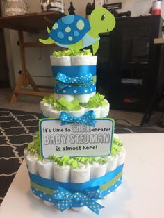 a diaper cake made to look like a turtle and it's baby shower