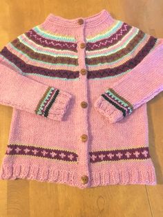 "Knitted long sleeve  fair isle 100% wool cardigan sweater. Its has 5 wooden buttons. Available  in sizes 6 month, 1 year Measurements are Size 6 months- finished chest 21\", length 11\" Size 1 - finished chest 23\", length 12\" Other sizes are available, see link below Size 2 - finished chest 25\", length 13\" Size 3 - finished chest 27\", length 14\" Size 4 - finished chest 27\", length 16\" Size 5 - finished chest 28\", length 16\" Size 6-8 finished chest 28', length 16 1/2\" Size 9-10 finish Baby Fair, Knitted Long Sleeve, Kids Jumpers, 2 Girl, Fair Isle Sweater, Wooden Buttons, Knitting Girls, Baby Sweaters, Wool Cardigan