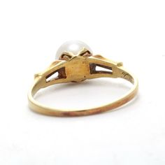 "Antique Pearl ring. 7mm cultured pearl, 14kt rose gold, yellow gold estate antique ring. Early 1900s Edwardian - Art deco. This is a risk-free purchase guaranteed to be as described and your complete satisfaction is assured by the simple 100% full refund return policy. If you don't love it, return it. Please see below, my shop policies, FAQ, and contact me for further details of the refund policy and guarantees. Early 1900s Antique fine quality cultured Pearl, 14kt yellow and rose gold ring. Th Antique 14k Gold Pearl Wedding Ring, Vintage Gold Hallmarked Pearl Ring, Victorian 14k Yellow Gold Pearl Ring, Victorian Style 14k Yellow Gold Pearl Ring, Classic 14k Gold Pearl Ring, Antique Yellow Gold 14k Pearl Ring, Vintage 14k Gold Pearl Wedding Ring, Classic 14k Stamped Pearl Wedding Ring, Classic 14k Stamped Pearl Ring For Wedding