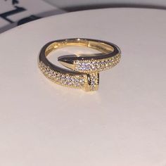 For Those Who Want More Sparkle In Life. Our Chunky Diamond Cut Stunning Sparkle Solid Gold Nail Ring Is For Making A Statement Or Layering With All Your Favorite Chains And Charms! Great For Everyday Wear And For Any Occasion. All Gold Is Real Gold Gem: Vvs Cz Swarovski 2.53 Grams Solid Gold Ring Size : 7 Can Be Sized Sizing Cost: 55$ Per Size Not Plated Free Appraisal! Comes With Gift Box Ready To Gift One Of The Best Selling Rings Perfect For Any And All Occasions Also Available In White Gold Luxury Cubic Zirconia Jewelry With Ring Detail, Luxury Bypass Ring As Gift, Luxury Gold Bypass Ring With Vvs Clarity, Formal Crystal Ring With Pave Setting, Luxury Gold Bypass Ring For Promise, Luxury Gold Bypass Ring With Diamond Accents, Luxury Gold Bypass Ring As Promise Ring, Luxury Gold Bypass Promise Ring, Aaa Quality Diamond Ring Jewelry