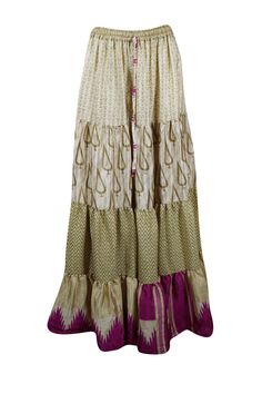 Inject a burst of lively energy into your wardrobe with this flared maxi skirt. It features upcycled saree fabric for an eco-friendly twist and boasts a Beige purple hue and intricate floral patterns paired with bold, striking prints. Each silk blends skirt is a unique masterpiece, and the adjustable drawstring waist offers a personalized, comfortable fit. The ankle-length, flowing silhouette adds elegance and ease, whether you're strolling through a farmer's market or dancing at a beach festiva Bohemian Maxi Skirt For Festive Occasions, Bohemian Maxi Skirt For Summer Festivals, Bohemian Tiered Skirt For Festive Occasions, Festive Bohemian Flared Skirt, Traditional Tiered Maxi Skirt For Festive Season, Traditional Tiered Festive Maxi Skirt, Bollywood Style Long Skirt For Summer, Bohemian Long Skirt For Navratri, Flowy Patchwork Maxi Skirt