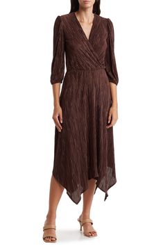 A handkerchief hem and plissé texture add dimension to a stem-baring dress that's perfect for a nicer occasion. 43 1/2" shortest length; 52 1/2" longest length Surplice V-neck Three-quarter sleeves 100% polyester Machine wash, line dry Imported Fitted Brown Pleated Midi Dress, Elegant Fitted Midi Dress With Handkerchief Hem, Brown Pleated Evening Dress, Elegant Fall Dress With Handkerchief Hem, Elegant Handkerchief Hem Fall Dress, Fitted Pleated Maxi Dress With Asymmetrical Hem, Fitted Asymmetrical Pleated Midi Dress, Asymmetrical Hem Pleated Formal Dress, Asymmetrical Pleated Fitted Midi Dress