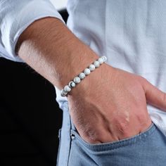 Embrace tranquility with our Certified Men's White Howlite Bracelet, a symbol of calm and style. This is not just a bracelet; It is a reflection of serenity and is perfect for elevating your appearance with positive energy. Made with Certified White Howlite, this Natural Stone Men's Jewelry is a versatile and stylish Crystal Bracelet. Crystal beads add a sophisticated touch, making it an indispensable accessory for men seeking both fashion and tranquility. 💎All stones are unique and may differ Modern White Bracelets With Round Beads, Modern White Round Beads Bracelets, Modern White Round Bead Bracelets, Modern White Round Beaded Bracelets, Modern White Adjustable Bracelets, Modern Adjustable White Bracelet, Everyday Stretch Bracelet With Round Beads, White Spiritual Jubilee Bracelet, Spiritual White Jubilee Bracelet