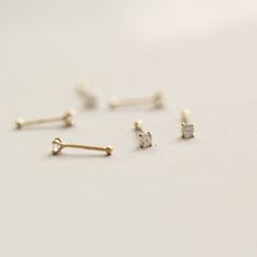 Style A tiny and cute 14K gold nose stud, without breaking the bank. You could never go wrong with such a classic design. It is a dazzling symbol of your personality. Metal It is made of 14K yellow gold. 14K gold contains 58.5% gold and 41.5% alloy. Compared to 10K, 18K, and 24K, it is the most popular choice, nearly 9 Small Nose Piercing, Small Nose Stud, Piercing Anti Tragus, Nasallang Piercing, Madonna Piercing, Canine Bites Piercing, Labret Vertical, Ashley Piercing, Vertical Labret Piercing