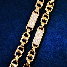 They say that good things come in small packages and our 8mm Square Clustered Cuban Chain Necklace is living proof of that! This premium quality, gold-plated necklace is decked out with shimmering cubic zirconia stones that are sure to turn heads wherever you go. And at a fraction of the price of similar designer pieces, this necklace is a total steal!Whether you're looking to add a touch of luxury to your everyday look or spice up your eveningwear, this versatile necklace is perfect for any occ Rock Jewelry, White Gold Chains, Hip Hop Jewelry, Cuban Chain, Gold Plated Necklace, Chains Jewelry, Men Necklace, Free Jewelry, Chain Bracelet