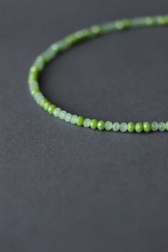 This unique choker necklace was made with mix of green crystal beads, two layers of strong nylon thread, stainless steel lobster claw with stainless steel adjustable length chain. Perfect for everyday wear! The length of necklace is about 40.5 cm or 15.9 inches and 4.5 cm of adjustable length steel chain. Other necklaces you can find in my store in the necklace section. https://www.etsy.com/shop/NaTavelli?section_id=14843046&ref=shopsection_leftnav_5 Thanks for a visit. Adjustable Green Choker Necklace, Minimalist Green Round Bead Necklaces, Green Minimalist Jewelry With Faceted Beads, Minimalist Green Jewelry With Faceted Beads, Adjustable Green Crystal Necklace, Adjustable Green Necklaces With Faceted Beads, Adjustable Green Necklace With Faceted Beads, Adjustable Green Double Strand Necklace, Green Necklaces With Tiny Beads For Everyday Wear