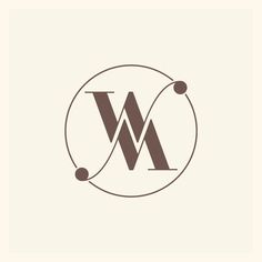 the letter w in a circle with dots