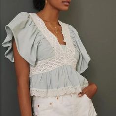 Nwt!! Never Been Worn! Description: V Neck Short Ruffle Sleeves Crochet Lace On Top Eyelet Embroidery On Top Measurements/Item Details Size - Small Bust - 18" Across (Laying Flat) Length - 19.5" Approx Color - Sky Fabric - Cotton Please Note: This Item Is New With Tags. Spring Day Out Crochet Top With Ruffles, Spring Crochet Top With Ruffles For Day Out, Spring Crochet Top With Lace Trim For Brunch, Chic Lace Patchwork Top, Chic Lace Patchwork Top For Day Out, Spring Cottagecore Lace Top, Feminine Lace Patchwork Crochet Top For Spring, Summer Short Sleeve Lace Top With Ruffles, Summer Lace Top With Ruffles And Short Sleeves