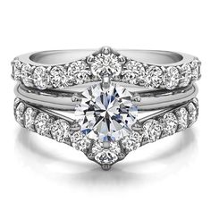 a diamond engagement ring set with two matching bands