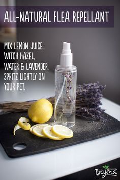 a bottle of lemon juice sitting on top of a cutting board next to sliced lemons