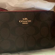 Never Been Used! Really Cute Coach Wristlet. Still Has Tags. Black Wristlet With Zipper Closure For Gift, Black Wristlet With Zipper Closure As Gift, Coach Coin Purse With Zipper Closure As Gift, Chic Wristlet With Zipper Closure For Gift, Coach Coin Purse With Zipper Closure, Coach Wallet With Zipper Closure For On-the-go, Coach Clutch, Bags Coach, Coach Horse And Carriage Tote