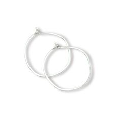 The minimal hoop earring collection has quickly made its way to our bestseller list. Light and easy to wear, they are a great minimalist addition to your jewelry collection. We love these sleek and sexy hoops! A single piece of wire is hand shaped and hammered into an organic shaped circle, measuring 1.4" tall by 1.4". Each one is made by hand so these measurements will vary slightly. Earring Details all components are sterling silver, gold filled or rose gold filled measuring 1.4"x1.4" wide han Minimalist Sterling Silver Hoop Jewelry, Minimalist Nickel-free Open Circle Hoop Earrings, Minimalist Hand Forged Circle Hoop Earrings, Sterling Silver Hoop Jewelry With A Modern Twist, Modern Twist Sterling Silver Hoop Jewelry, Minimalist Wire Wrapped Hoop Earrings, Minimalist Wire Wrapped Round Hoop Earrings, Minimalist Small Hoop Sterling Silver Earrings, Modern Hand Forged Circle Hoop Earrings