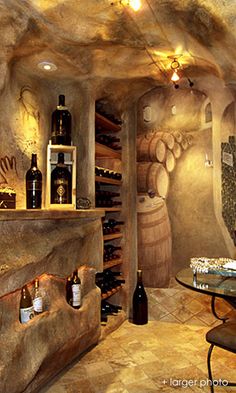 a wine cellar with several bottles in it