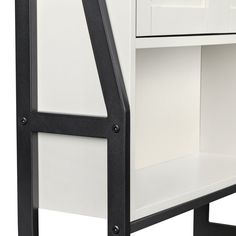 an image of a white and black desk with drawers on one side or the other