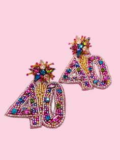 Celebrate turning 40 with style and a bit of flair with these cute number earrings. Perfect for you or someone special (or just as a fun gift for someone else), these lightweight earrings are made with nickel-free, surgical steel and felt backs, so you can wear them comfortably all day long. Nickel-free Pink Earrings For Birthday, Fun Silver Earrings For Birthday, Trendy Birthday Earrings For Pierced Ears, Trendy Silver Earrings For Birthday, Nickel-free Multicolor Earrings For Birthday, Birthday Drop Earrings, Trendy Personalized Earrings For Birthday, Nickel-free Earrings For Birthday, Multicolor Drop Earrings For Birthday