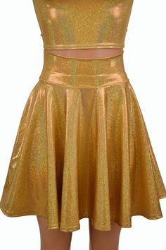 "This item is made to order, please read all the way through the listing before purchasing! This holographic sparkly gold set is made of four way stretch spandex with the prettiest shine and sparkle! The crop top has cap sleeves and a short collar at the neck and measures 8\" from underarm to hemline. The skirt is 19\" long and sets at the natural waist. Depending on your torso length you may or may not flash a bit of skin! Super cute and lots of fun! Womens Sizing (See below for instructions on Gold Stretch Skirt For Party, Gold Crop Top For Club Party, Fitted Glamorous Gold Skirt, Gold Stretch Crop Top, Fitted Cropped Gold Crop Top, Fitted Gold Mini Skirt, Cheap Gold Mini Skirt, Gold Crop Top, Gold Shirt